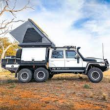 This model is equipped with a perforated mattress (50 mm thick) and a folding ladder that is long enough to allow you to climb onto the highest SUV roof on the market. The poles that come with the tent can be used to make small awnings on both sides of th