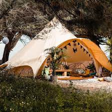 These premium bell tents are made of high-quality cotton canvas, sturdy frames, metal center poles, and some are even built for year-round living!